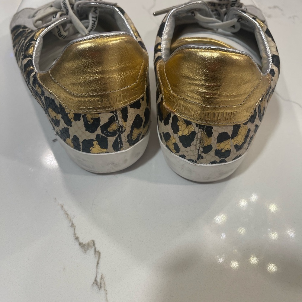 Zagdig and Voltaire cheetah sneakers. Size 10. Worn light scuff on one sneaker.